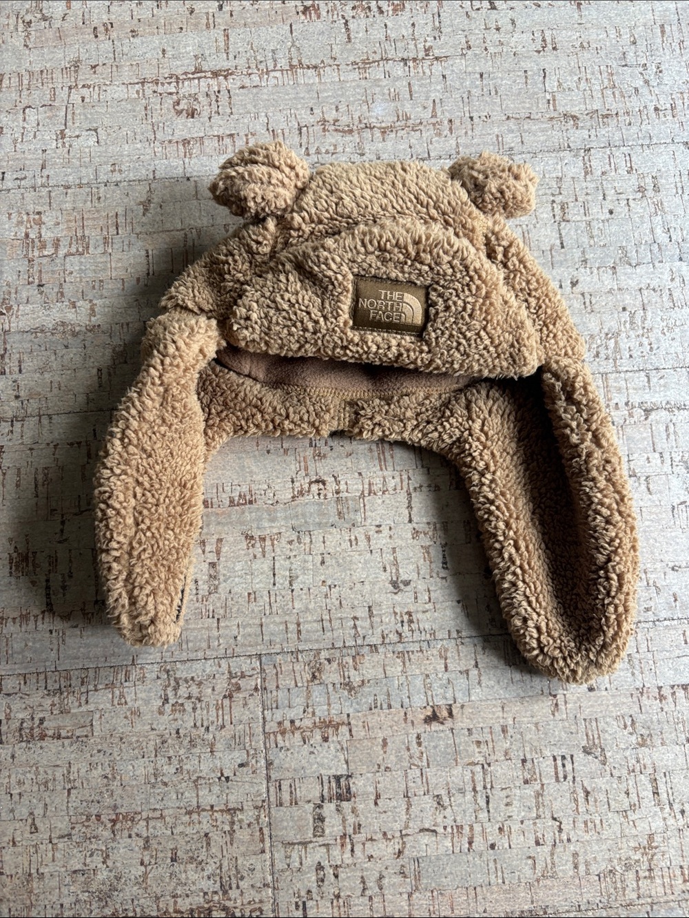 The North Face Teddy Earflap Hat in Tan